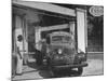 Car Sitting at a Gas Station on the Island of Martinique-David Scherman-Mounted Premium Photographic Print