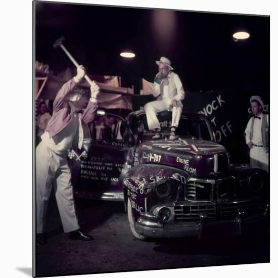 Car Smash Fundraiser with College Men Sledge Hammering a Car for Charity, USA 1954-Nina Leen-Mounted Photographic Print