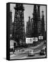 Car Traffic on Highway Next to Advertising Billboards and Oil Well Towers, Signal Hill Oil Field-Andreas Feininger-Framed Stretched Canvas