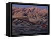 Car Traveling Through Badlands National Park-Layne Kennedy-Framed Stretched Canvas