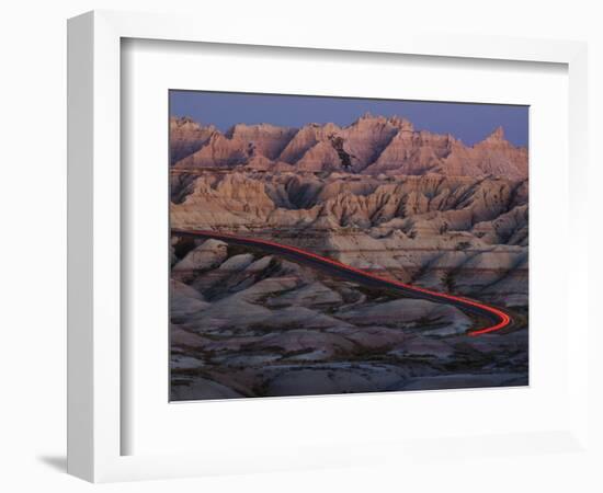 Car Traveling Through Badlands National Park-Layne Kennedy-Framed Photographic Print