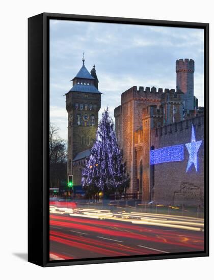 Cardiff Castle with Christmas Lights and Traffic Light Trails, Cardiff, South Wales, Wales, United -Billy Stock-Framed Stretched Canvas