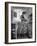 Career Girl Hostedd Joan Wilson in skirt and sleeveless blouse cooking in kitchen-Nina Leen-Framed Photographic Print