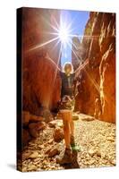 Carefree tourist woman enjoying the picturesque natural alleyway of Standley Chasm, Australia-Alberto Mazza-Stretched Canvas