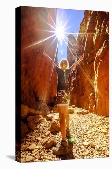 Carefree tourist woman enjoying the picturesque natural alleyway of Standley Chasm, Australia-Alberto Mazza-Stretched Canvas