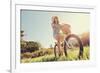 Carefree Woman Riding Bicycle in Park Having Fun on Summer Afternoon-warrengoldswain-Framed Photographic Print