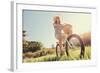 Carefree Woman Riding Bicycle in Park Having Fun on Summer Afternoon-warrengoldswain-Framed Photographic Print