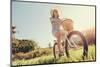 Carefree Woman Riding Bicycle in Park Having Fun on Summer Afternoon-warrengoldswain-Mounted Photographic Print
