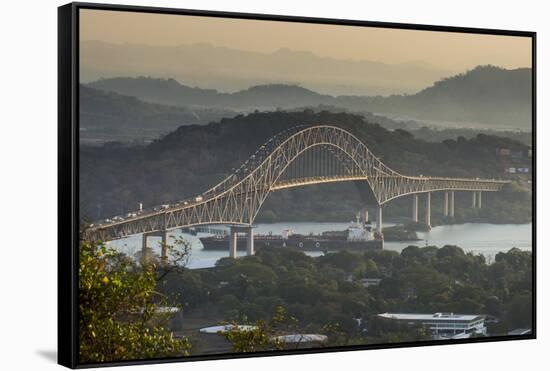 Cargo boat passes the Bridge of the Americas on the Panama Canal, Panama City, Panama, Central Amer-Michael Runkel-Framed Stretched Canvas