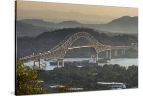 Cargo boat passes the Bridge of the Americas on the Panama Canal, Panama City, Panama, Central Amer-Michael Runkel-Stretched Canvas