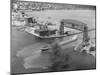 Cargo Boat Passing under Bridge-Charles Rotkin-Mounted Photographic Print