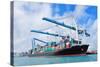 Cargo Ship at Miami Harbor with Crane and Blue Sky over Sea.-Songquan Deng-Stretched Canvas