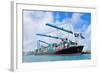 Cargo Ship at Miami Harbor with Crane and Blue Sky over Sea.-Songquan Deng-Framed Photographic Print