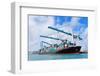 Cargo Ship at Miami Harbor with Crane and Blue Sky over Sea.-Songquan Deng-Framed Photographic Print