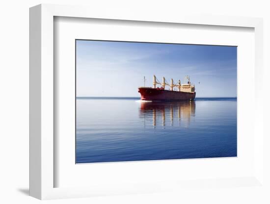 Cargo Ship Sailing in Still Water-aleksey.stemmer-Framed Photographic Print