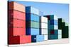 Cargo Shipping Containers Stacked at Harbor Freight Terminal under Clear Blue Sky-Sascha Burkard-Stretched Canvas