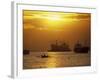 Cargo Ships and Outrigger Canoe in Manila Bay at Sunset, in the Philippines, Southeast Asia-Robert Francis-Framed Photographic Print