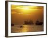 Cargo Ships and Outrigger Canoe in Manila Bay at Sunset, in the Philippines, Southeast Asia-Robert Francis-Framed Photographic Print