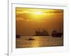 Cargo Ships and Outrigger Canoe in Manila Bay at Sunset, in the Philippines, Southeast Asia-Robert Francis-Framed Photographic Print