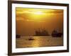 Cargo Ships and Outrigger Canoe in Manila Bay at Sunset, in the Philippines, Southeast Asia-Robert Francis-Framed Photographic Print