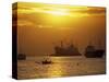 Cargo Ships and Outrigger Canoe in Manila Bay at Sunset, in the Philippines, Southeast Asia-Robert Francis-Stretched Canvas