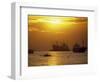 Cargo Ships and Outrigger Canoe in Manila Bay at Sunset, in the Philippines, Southeast Asia-Robert Francis-Framed Photographic Print