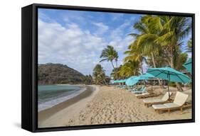 Caribbean, Grenada, Mayreau Island. Beach umbrellas and lounge chairs.-Jaynes Gallery-Framed Stretched Canvas