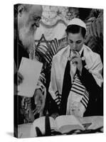 Carl Jay Bodek with Rabbi David S. Novoseller Reciting from the Prayer Book-Lisa Larsen-Stretched Canvas