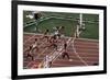 Carl Lewis Crosses the Finishing Line at the Los Angeles Olympics-null-Framed Photographic Print