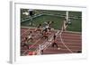 Carl Lewis Crosses the Finishing Line at the Los Angeles Olympics-null-Framed Photographic Print