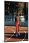 Carl Lewis Walks on An Athletic Track-null-Mounted Photographic Print