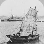 Chinese junk and British battleship in the harbour at Hong Kong, 1902-Carlton Harlow Graves-Laminated Photographic Print