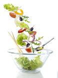 Salad Ingredients Falling into a Glass Bowl-Caroline Martin-Laminated Photographic Print