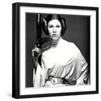 CARRIE FISHER. "Star Wars: Episode IV-A New Hope" [1977], directed by GEORGE LUCAS.-null-Framed Photographic Print