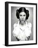 CARRIE FISHER. "Star Wars: Episode IV-A New Hope" [1977], directed by GEORGE LUCAS.-null-Framed Photographic Print