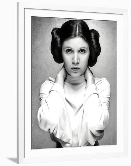 CARRIE FISHER. "Star Wars: Episode IV-A New Hope" [1977], directed by GEORGE LUCAS.-null-Framed Photographic Print