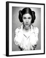 CARRIE FISHER. "Star Wars: Episode IV-A New Hope" [1977], directed by GEORGE LUCAS.-null-Framed Photographic Print