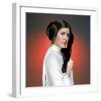 CARRIE FISHER. "Star Wars: Episode IV-A New Hope" [1977], directed by GEORGE LUCAS.-null-Framed Photographic Print