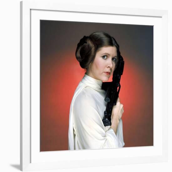 CARRIE FISHER. "Star Wars: Episode IV-A New Hope" [1977], directed by GEORGE LUCAS.-null-Framed Photographic Print