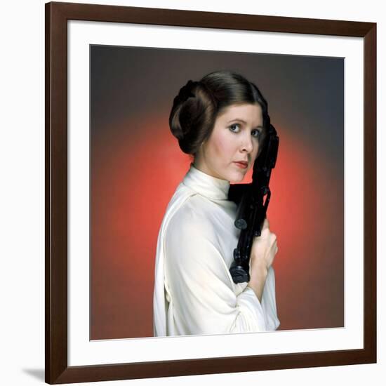 CARRIE FISHER. "Star Wars: Episode IV-A New Hope" [1977], directed by GEORGE LUCAS.-null-Framed Photographic Print