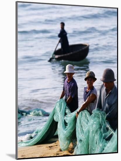 Carrying Fishing Nets Up the Beach after the Day's Work-Paul Harris-Mounted Photographic Print