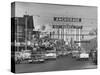 Cars Driving Through City-Nat Farbman-Stretched Canvas