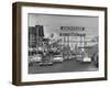 Cars Driving Through City-Nat Farbman-Framed Premium Photographic Print