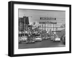Cars Driving Through City-Nat Farbman-Framed Photographic Print