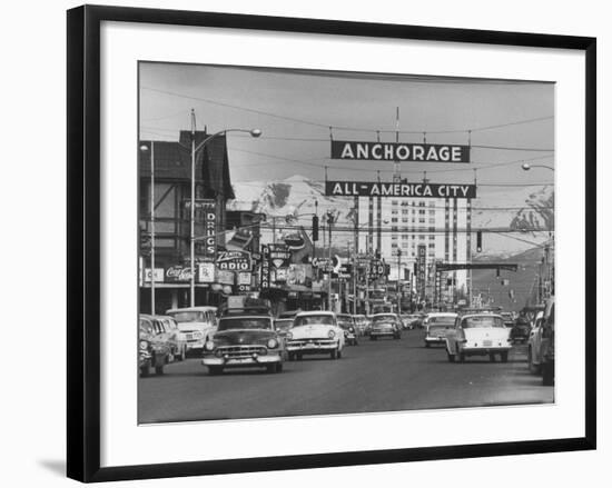 Cars Driving Through City-Nat Farbman-Framed Photographic Print