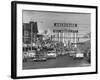 Cars Driving Through City-Nat Farbman-Framed Photographic Print