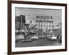 Cars Driving Through City-Nat Farbman-Framed Photographic Print