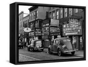 Cars Parked in Front of Four Navy Uniform Stores on Sand Street-Andreas Feininger-Framed Stretched Canvas