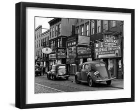 Cars Parked in Front of Four Navy Uniform Stores on Sand Street-Andreas Feininger-Framed Photographic Print