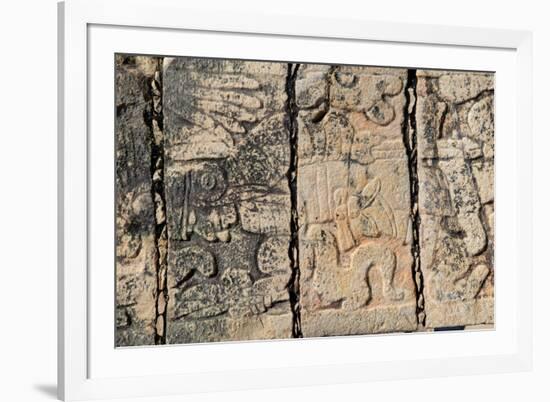 Carved stonework on the Temple of the Warriors at the ancient Mayan city of Chichen Itza, in Yuc...-null-Framed Photographic Print